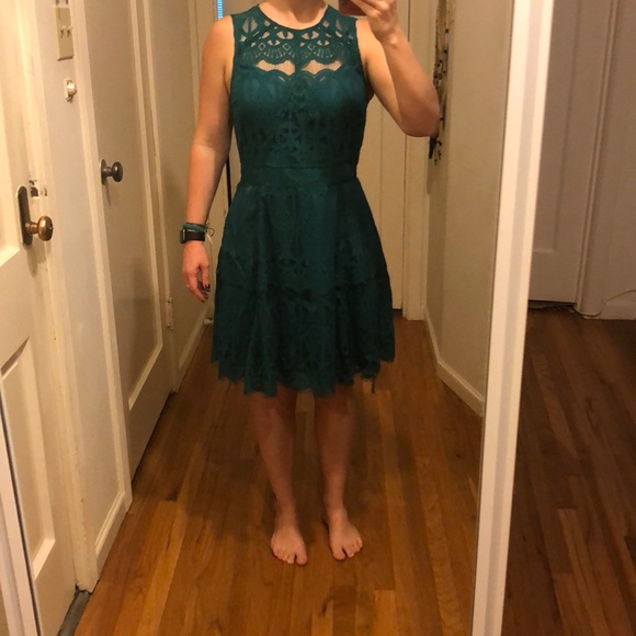 Lace dress with peek-a-boo bodice - Picture 3 of 5